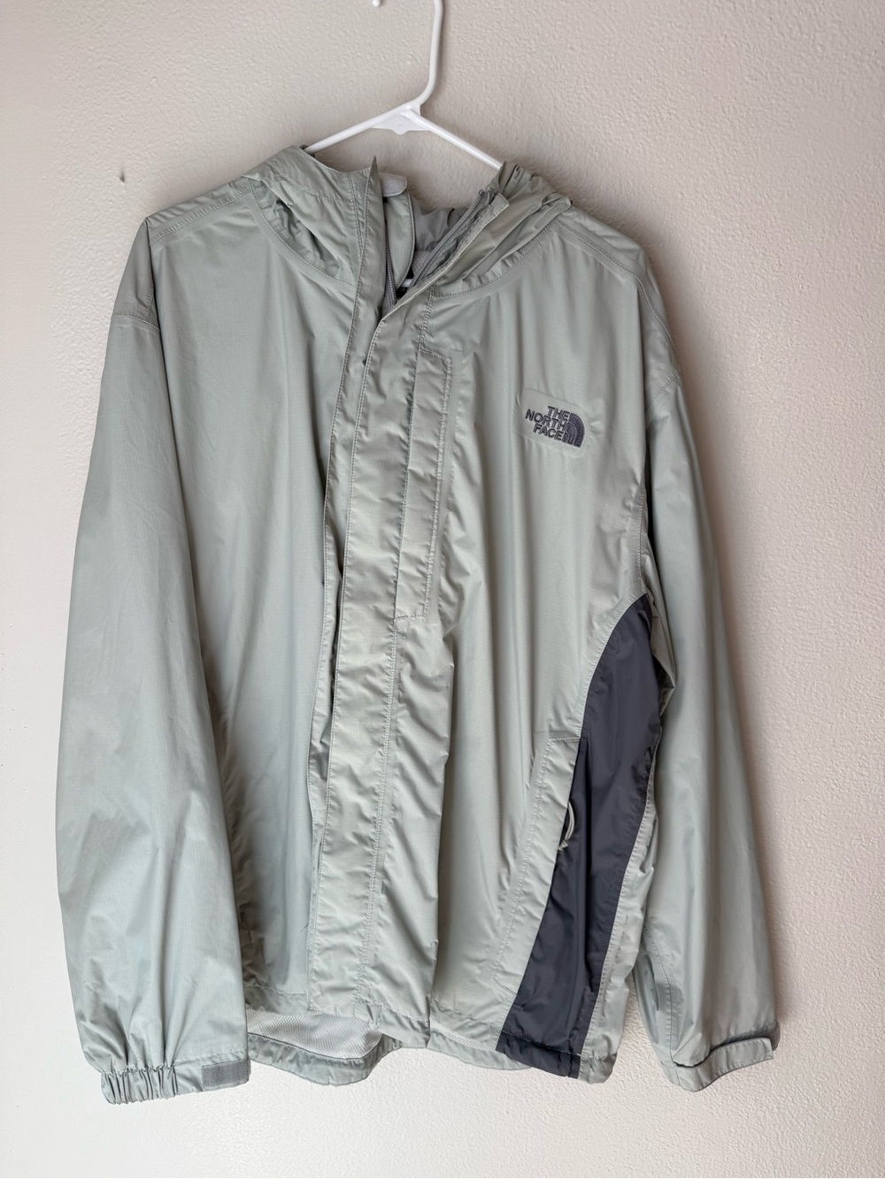 The North Face Men's Hooded Raincoat in Light Gray with Dark Gray Panels